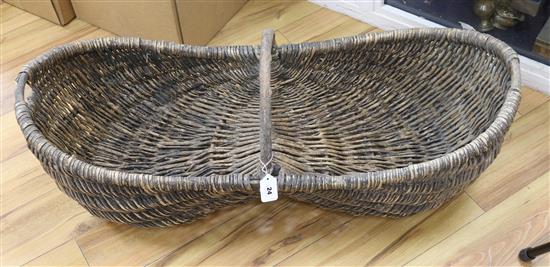 A French Provincial wine basket length 104cm width 40cm